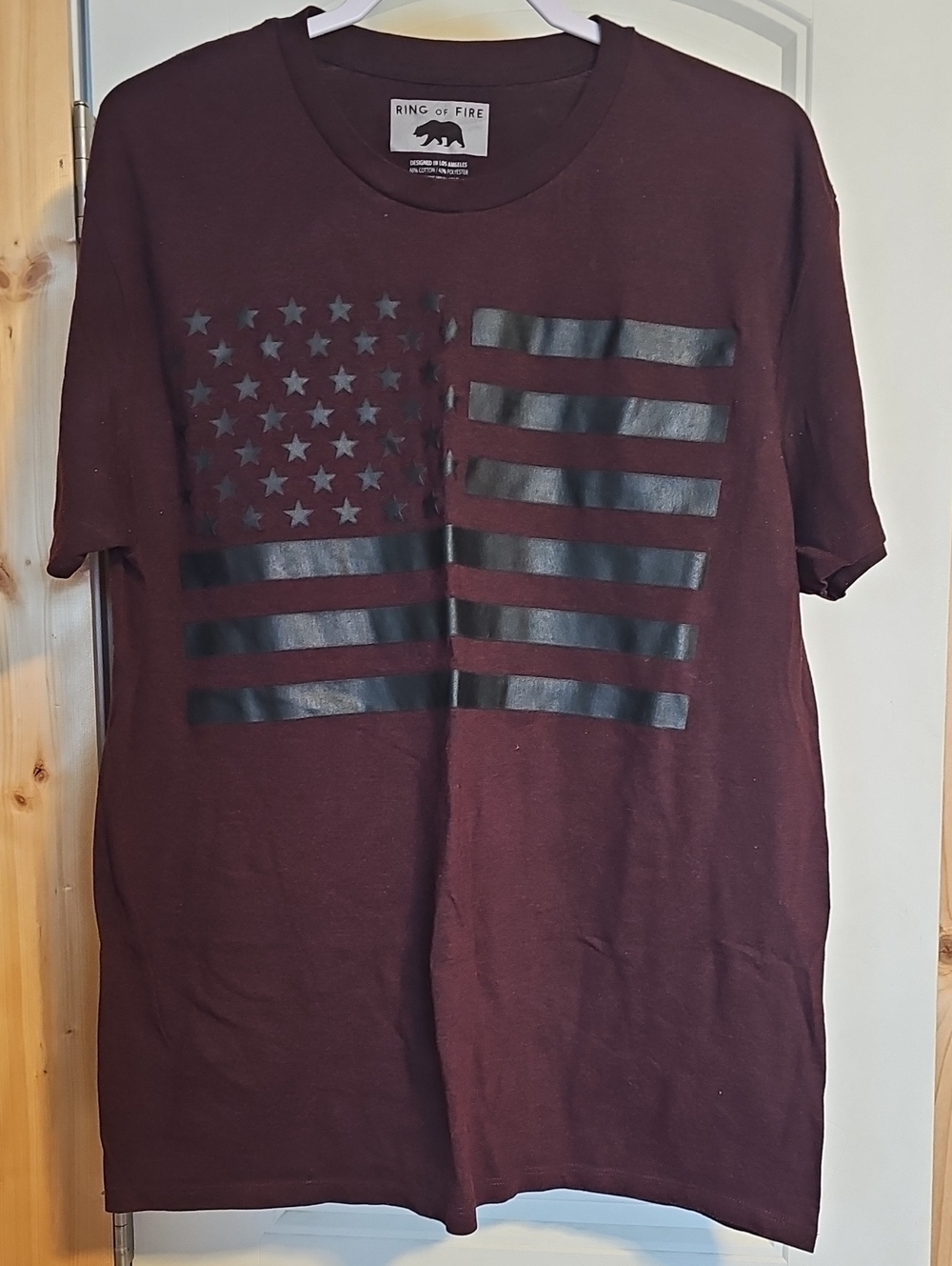 Ring of Fire Men’s Maroon Short-Sleeve Tee with Black Flag Graphic